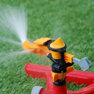 Plastic warrior sprinkler on spike